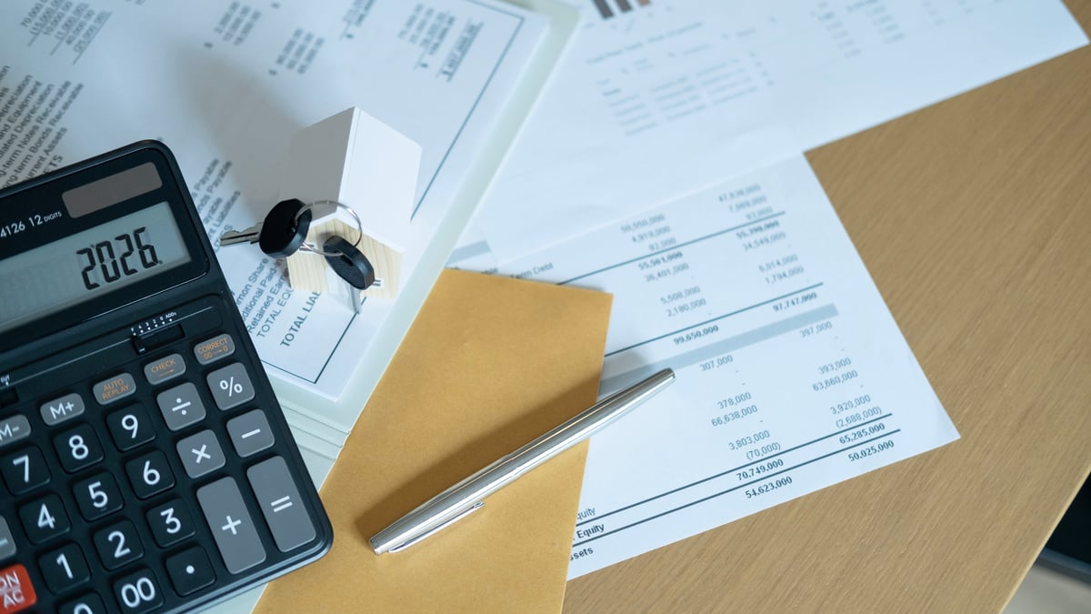 What are payments on account for self assessment explained with HMRC tax payment calculation using calculator and financial documents